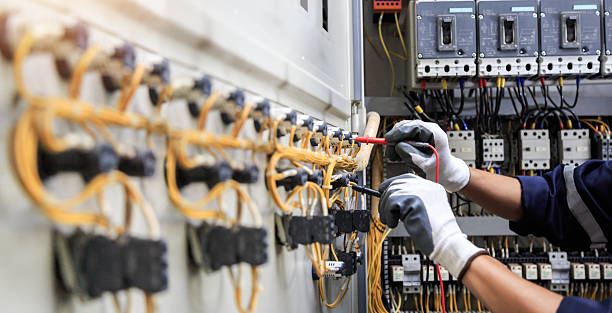 Professional Electrician technician working in North Randall, OH